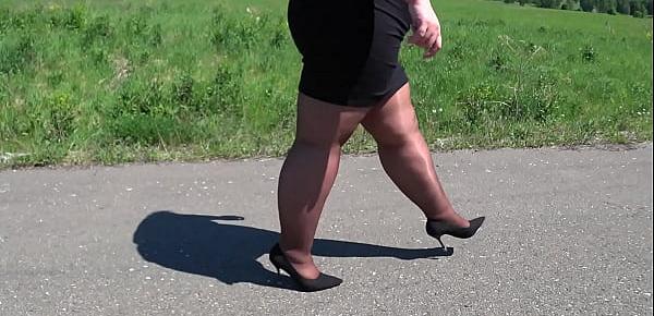 trendsMature BBW in nylon pantyhose and high heels walks down the public road Foot fetish Big booty ASMR